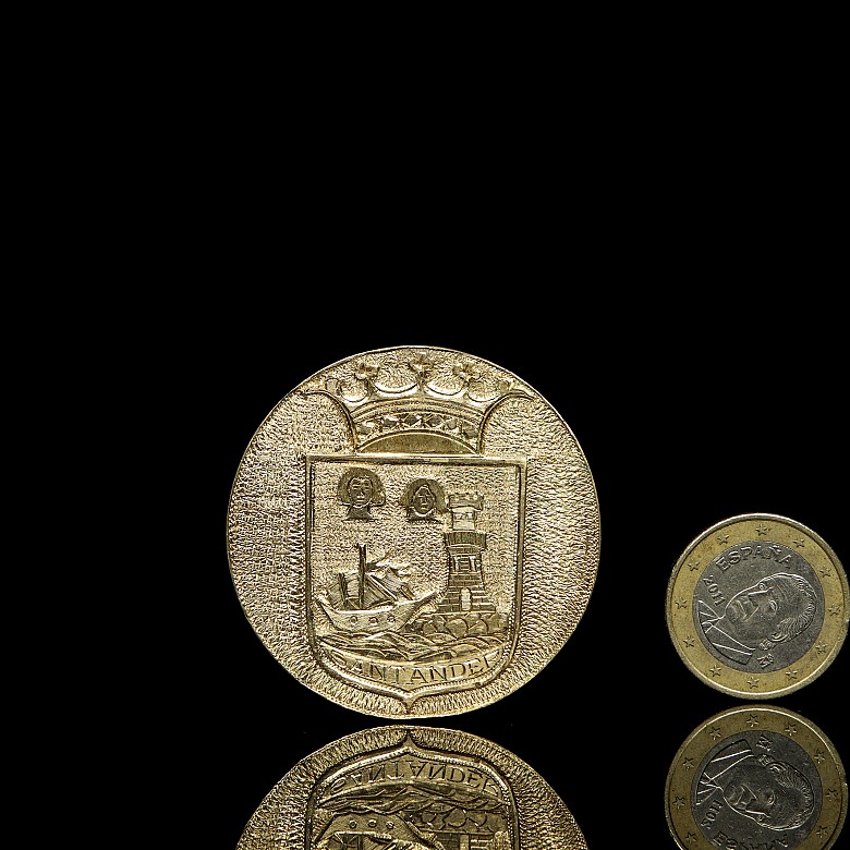 Moneda medalla de oro 