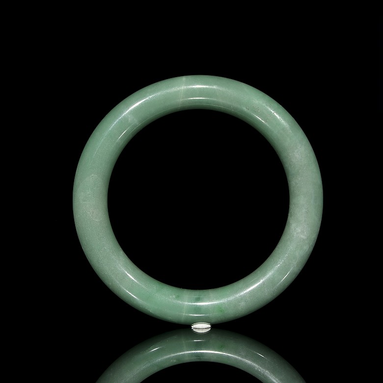 Carved green jadeite bangle, 20th century