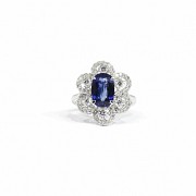 18k white gold ring with sapphire and diamonds.