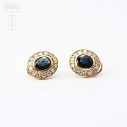 Sapphire earrings in 18k yellow gold and diamonds.