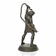 Figura en bronce según el 