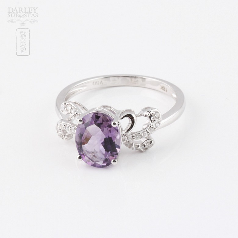 18k white gold ring with amethyst and diamonds.