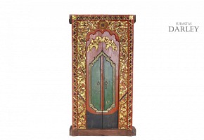 A carved and painted wooden Indonesian temple doors, 19th - 20th century