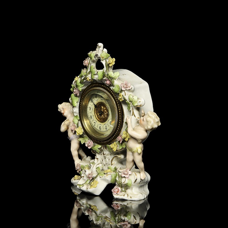 German porcelain clock ‘Infants’, 20th century