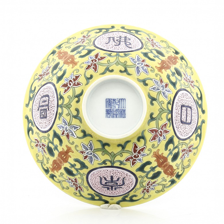 A famille rose yellow-ground bowl, Qianlong seal mark.