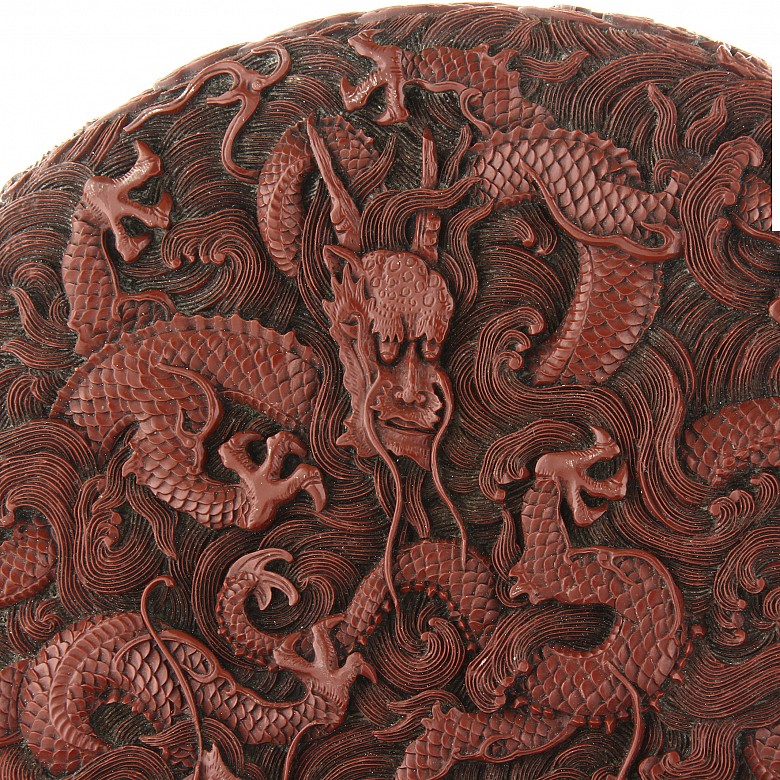 A carved cinnabar lacquer 