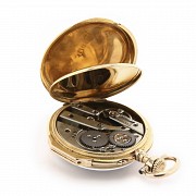 Martinot pocket watch in 14K gold.