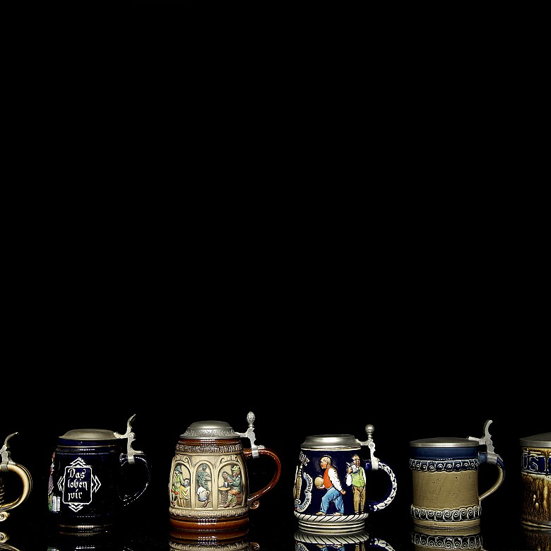 Six glazed ceramic beer steins, 20th century