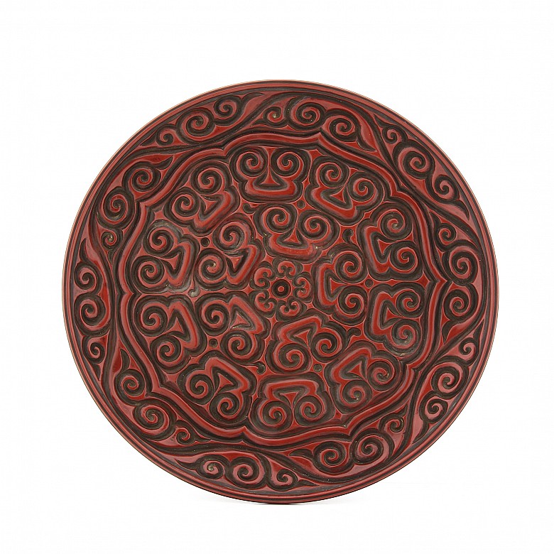 A large carved cinnabar lacquer dish, China, Qing Dynasty.