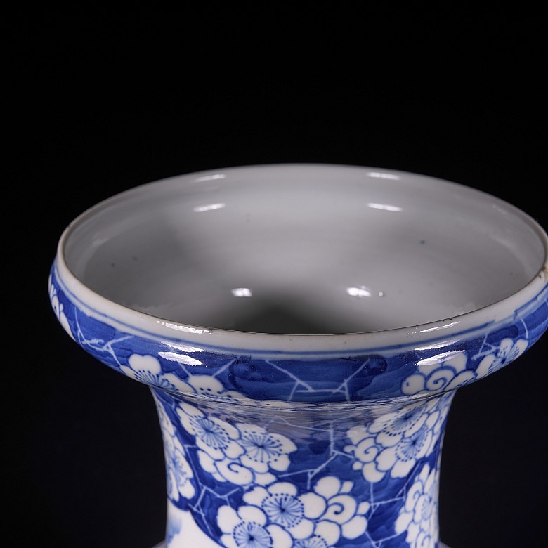 Pair of blue and white ‘Scenes and Plum Blossom’ vases, Qing Dynasty