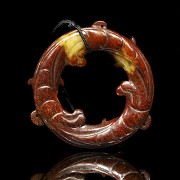 Tail biting dragon hoop, Eastern Han dynasty