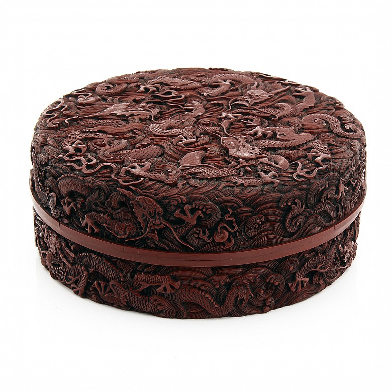 A carved cinnabar lacquer 