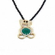 18k rose gold necklace with emerald and diamonds.