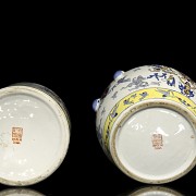 Pair of enamelled porcelain vessels, 20th century