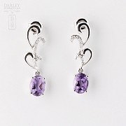 Earrings in 18k white gold, with amethysts and diamonds.