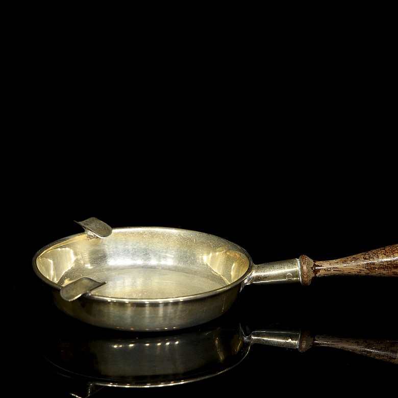 Three silver objects with wooden handles, 20th century