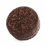 A carved cinnabar lacquer 