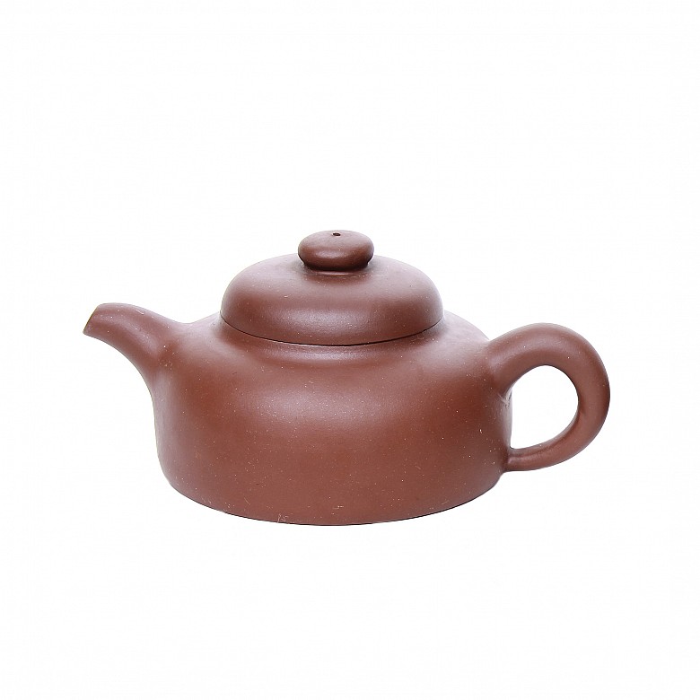 Clay Yixing teapot.