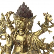 A gilt-bronze figure of Mahakala Sadbhuja, 18th century.