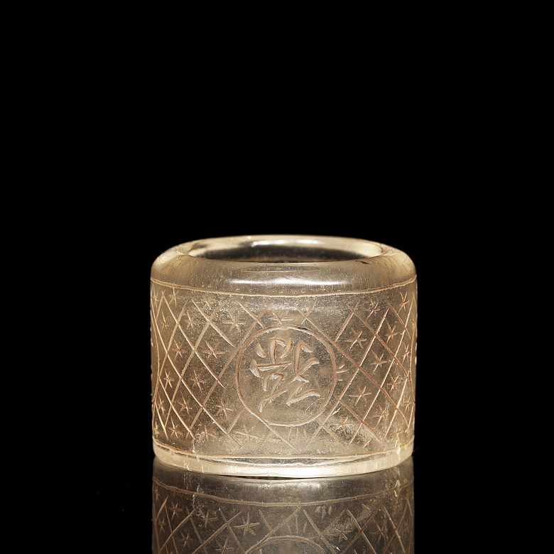 Carved quartz ring with characters, 20th century