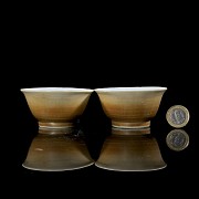 Pair of glazed porcelain bowls, with mark on the base