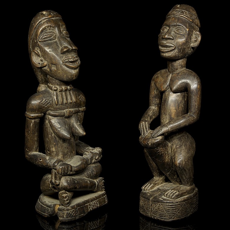 Dos figuras africanas de madera tallada, estilo Yoruba, s.XX