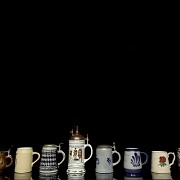 Collection of ten ceramic beer steins, 20th century