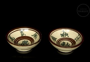 Two small glazed ceramic bowls ‘Symbols’, 20th century