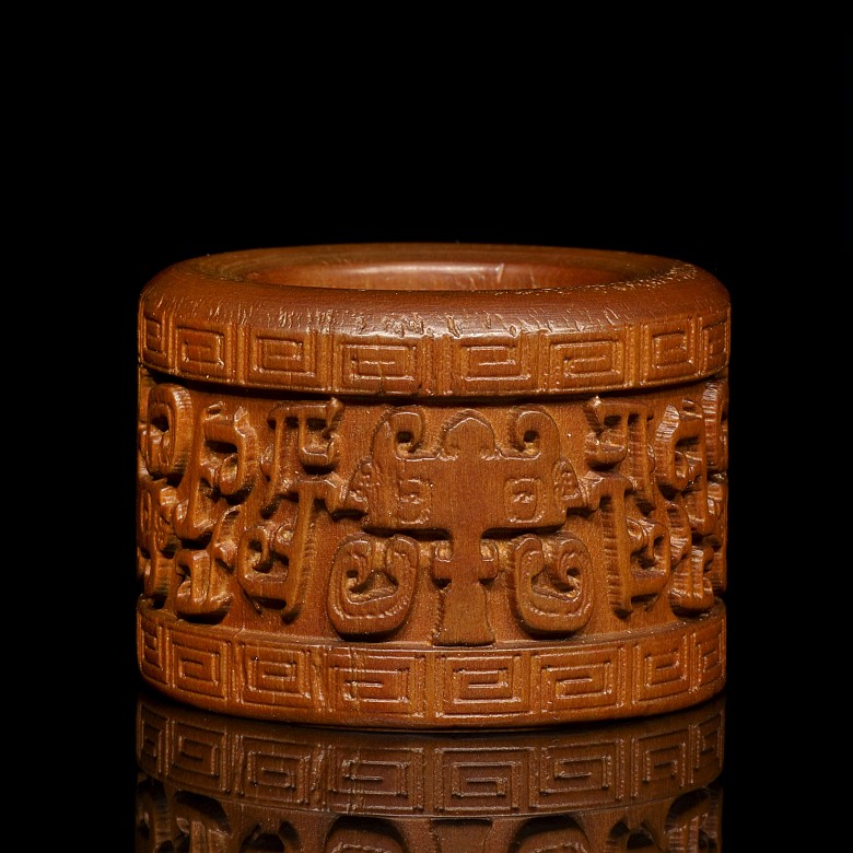 Carved wooden ring, 20th Century