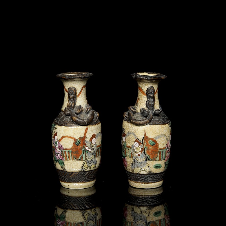 Pair of small Nanking vases, ‘Warriors’, 20th century