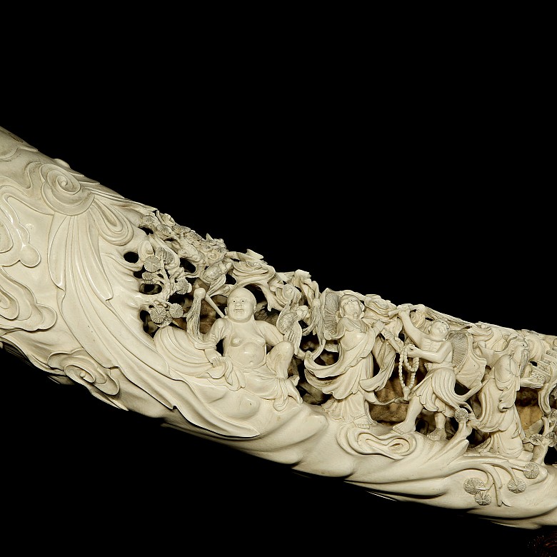 Carved ivory tusk ‘Immortals’ on wooden base, 19th century