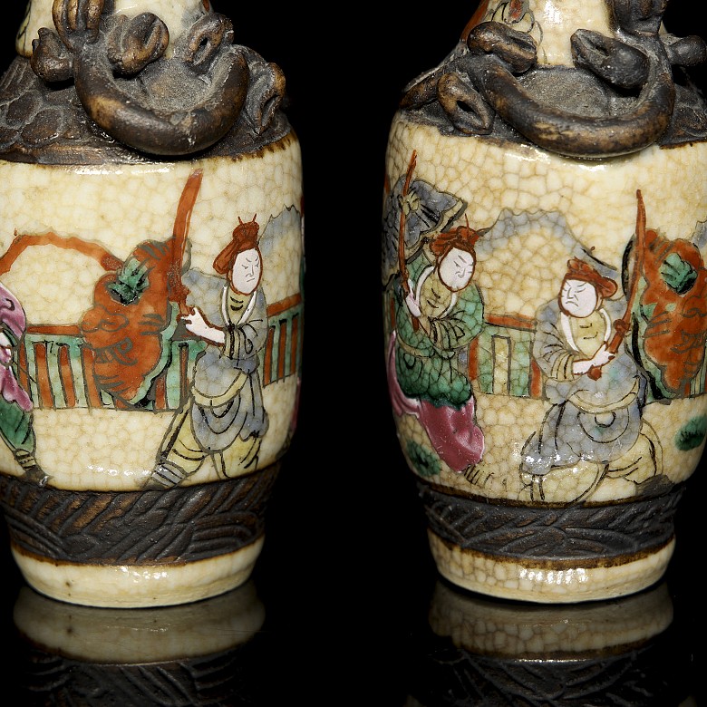 Pair of small Nanking vases, ‘Warriors’, 20th century