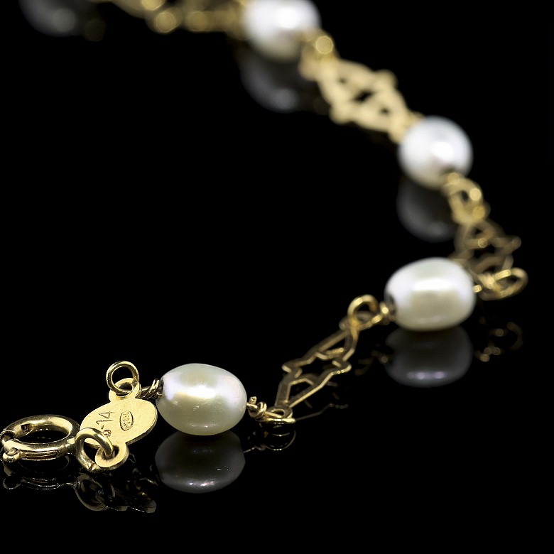 Pulsera de oro amarillo 18 k y perlas