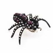 Silver brooch in the shape of a spider.