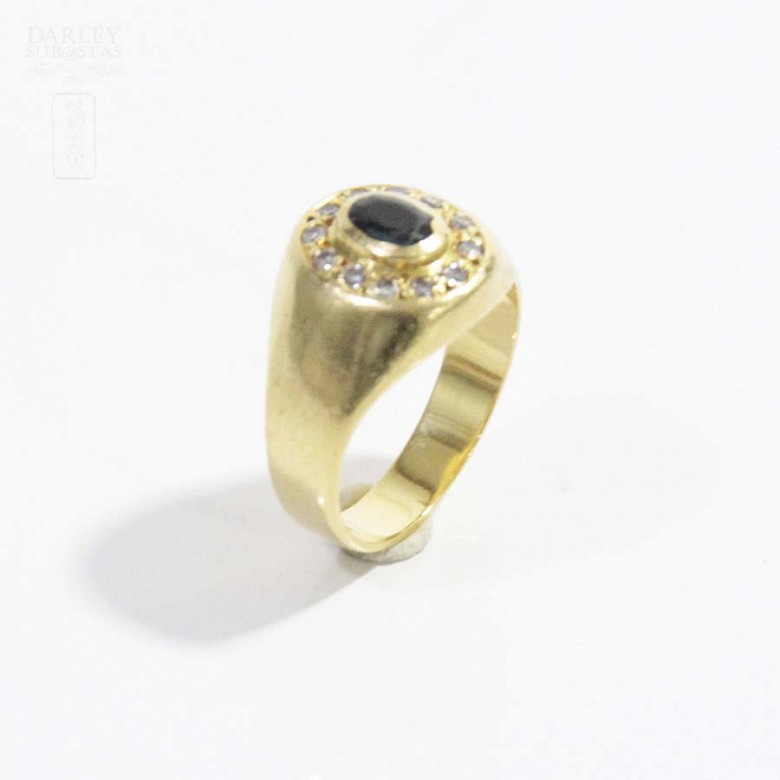 18k yellow gold seal ring with sapphire and diamonds.