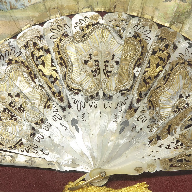 Mother-of-pearl fan with fan holder ‘Society Scene’, 20th century