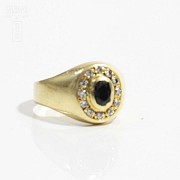 18k yellow gold seal ring with sapphire and diamonds.