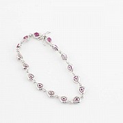 18k white gold bracelet with rubies and diamonds.