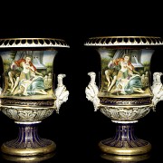 Pair of porcelain enamelled urns ‘Lovers’, 20th century