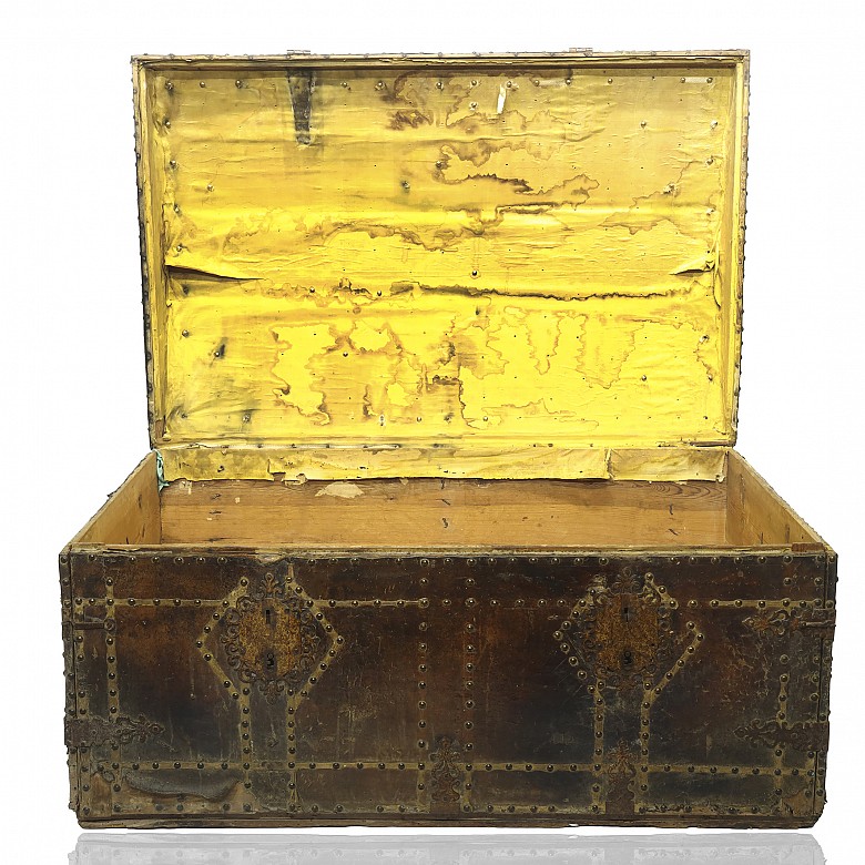 A wood and leather trunk, 18th century