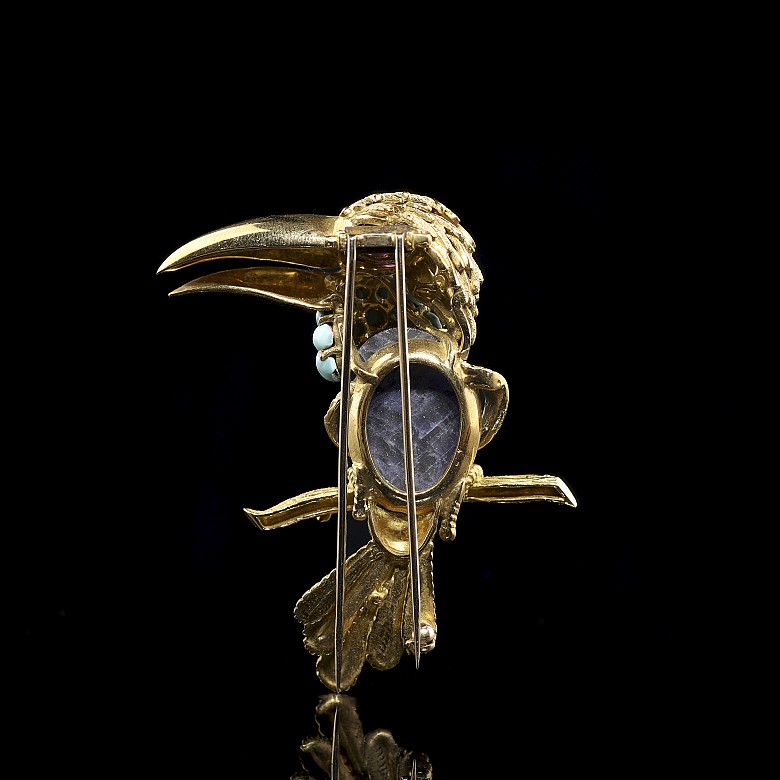 Yellow gold brooch with toucan shape