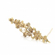 18k yellow gold and zirconia brooch