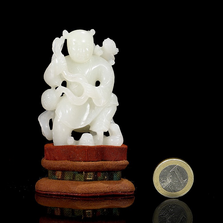 Hetian white jade figurine “Child and dogs”, Qing dynasty