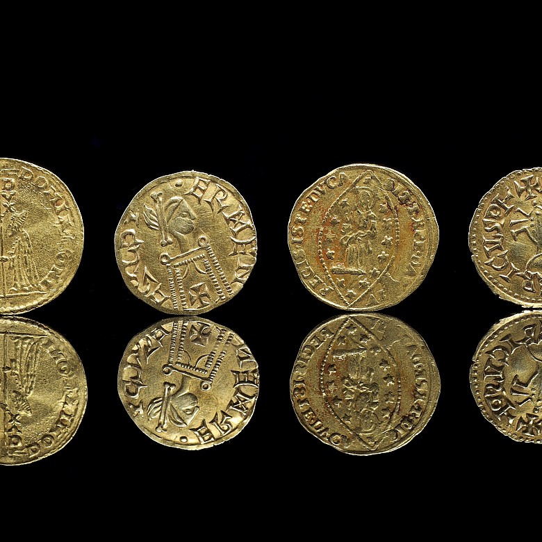 Group of four gold coins