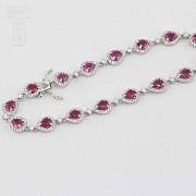 18k white gold bracelet with rubies and diamonds.