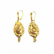 14k yellow gold earrings.