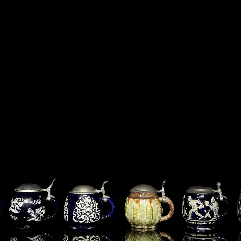 Six enamelled German beer steins, 20th century