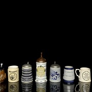 Collection of ten ceramic beer steins, 20th century