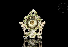 German porcelain clock ‘Infants’, 20th century