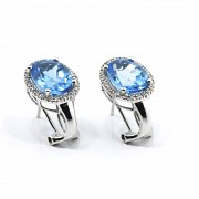 18 k white gold earrings with topaz and diamonds.